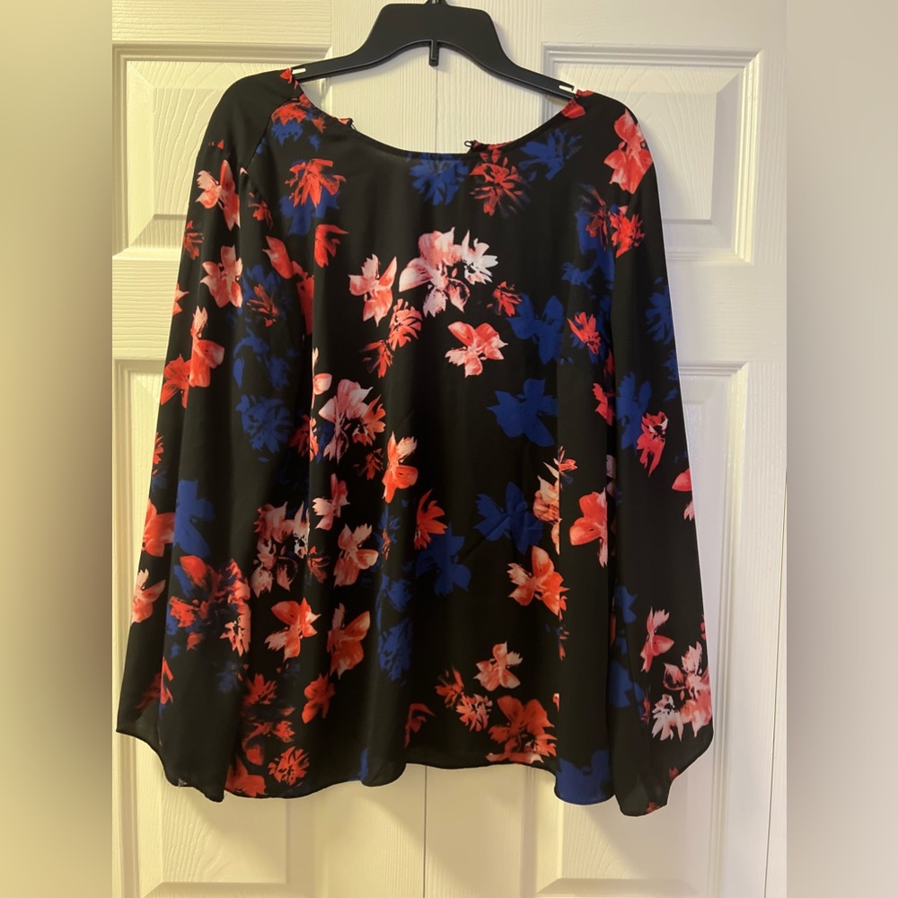 Fashionable red and blue printed top that's perfect for adding to your wardrobe.